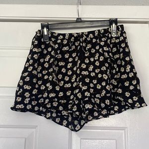 Black flower shorts with ruffles